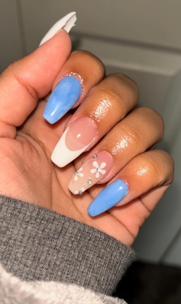 light blue, white French tip, and white flowers coffin shaped nails
