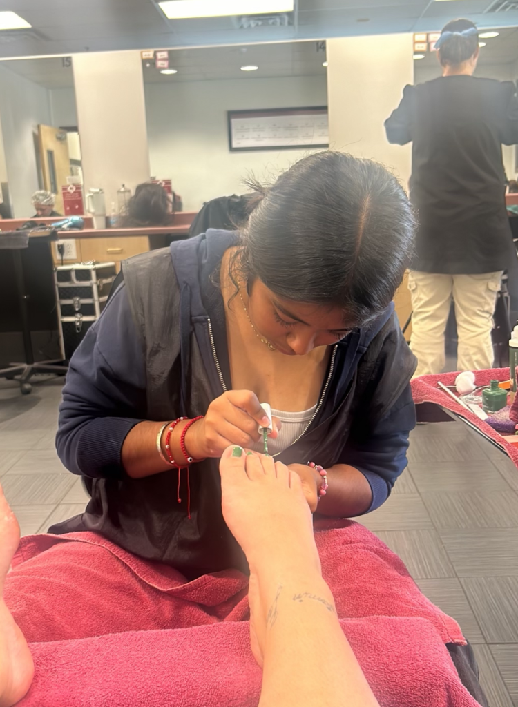 girl doing a pedicure